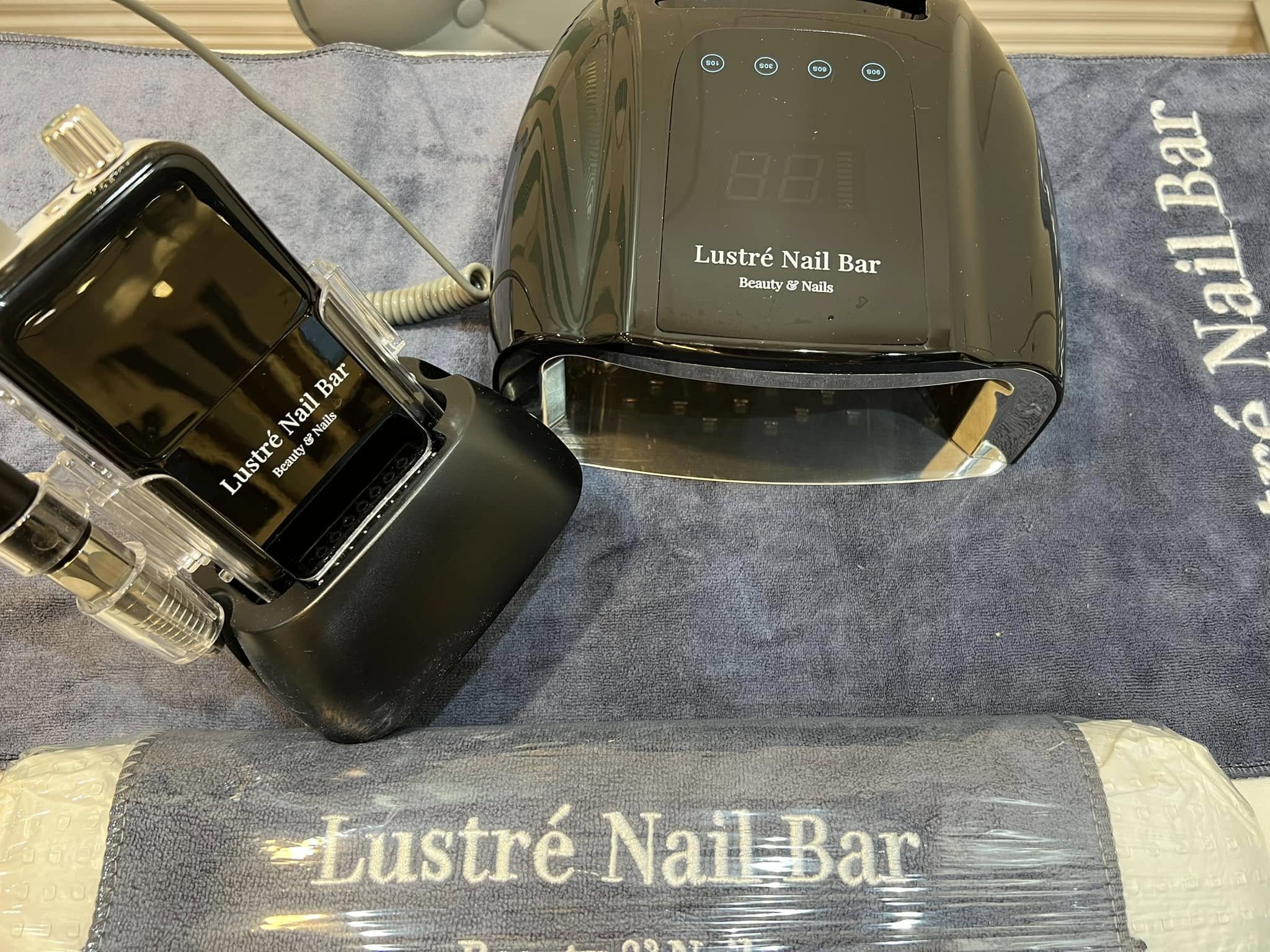 Lustre Nail Bar branded nail lamp and equipment